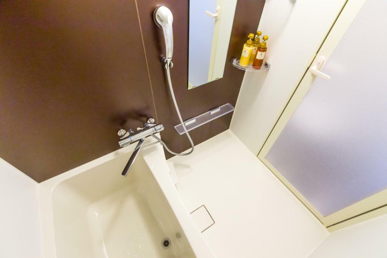 Mr. Kinjo In Airport Aparthotel Наха Екстериор снимка